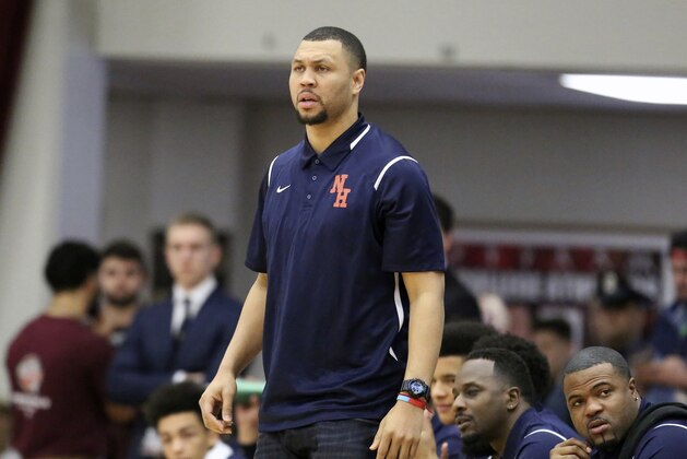 FILE - In this Jan. 16, 2017, file photo, Nathan Hale's head coach Brandon Roy is seen on the sidelines against Oak Hill Academy during a high school basketball game at the 2017 Hoophall Classic, in Springfield, Mass. Authorities say former NBA player Brandon Roy was shot while attending a party in Southern California over the weekend. Los Angeles County sheriff's Lt. Joseph Williams said Wednesday, May 3, 2017, that Roy was one of four people shot in Compton on Saturday. (AP Photo/Gregory Payan, File)