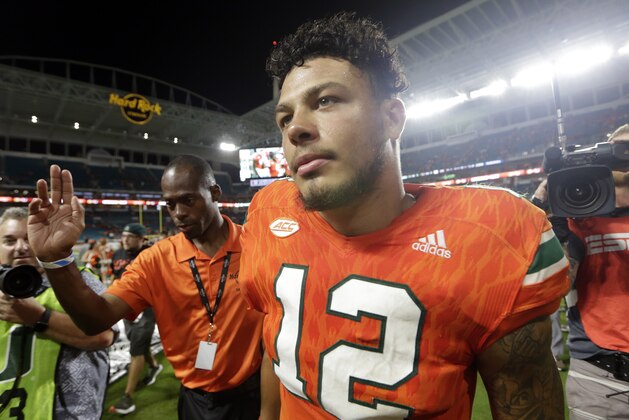 Miami quarterback Malik Rosier (12) walks off the field after an NCAA college football game against Notre Dame, Saturday, Nov. 11, 2017, in Miami Gardens, Fla. Miami won 41-8. (AP Photo/Lynne Sladky)