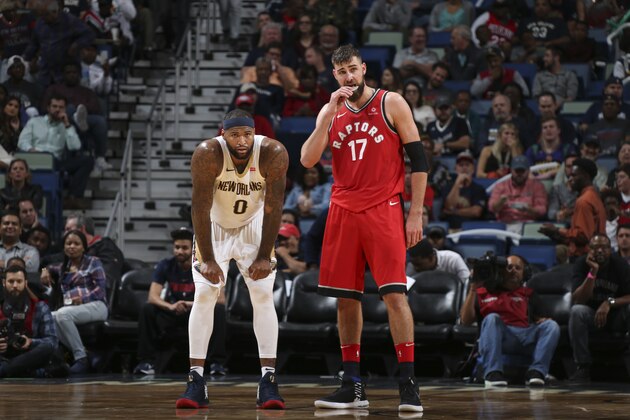 NEW ORLEANS, LA - NOVEMBER 15: DeMarcus Cousins #0 of the New Orleans Pelicans and Jonas Valanciunas #17 of the Toronto Raptors look on during game on November 15, 2017 at the Smoothie King Center in New Orleans, Louisiana. NOTE TO USER: User expressly acknowledges and agrees that, by downloading and or using this Photograph, user is consenting to the terms and conditions of the Getty Images License Agreement. Mandatory Copyright Notice: Copyright 2017 NBAE (Photo by Layne Murdoch Jr./NBAE via Getty Images)v