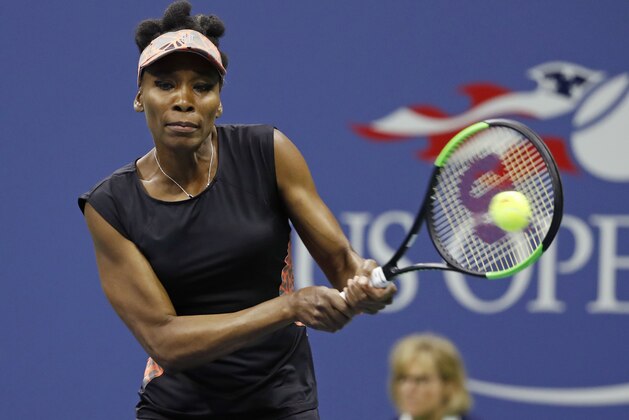 Venus Williams, of the United States, returns a shot from Sloane Stephens, of the United States, during the semifinals of the U.S. Open tennis tournament, Thursday, Sept. 7, 2017, in New York. (AP Photo/Adam Hunger)