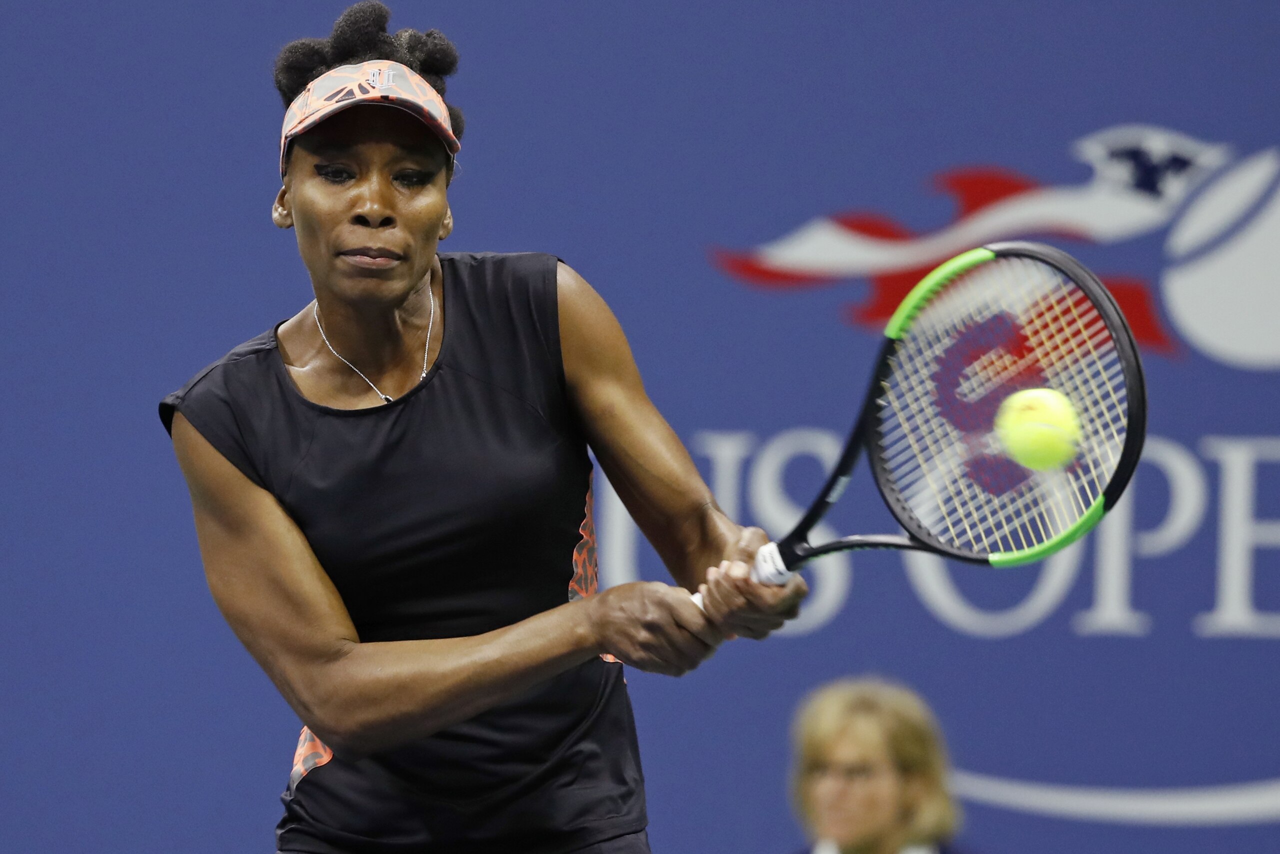 Venus Williams, of the United States, returns a shot from Sloane Stephens, of the United States, during the semifinals of the U.S. Open tennis tournament, Thursday, Sept. 7, 2017, in New York. (AP Photo/Adam Hunger)