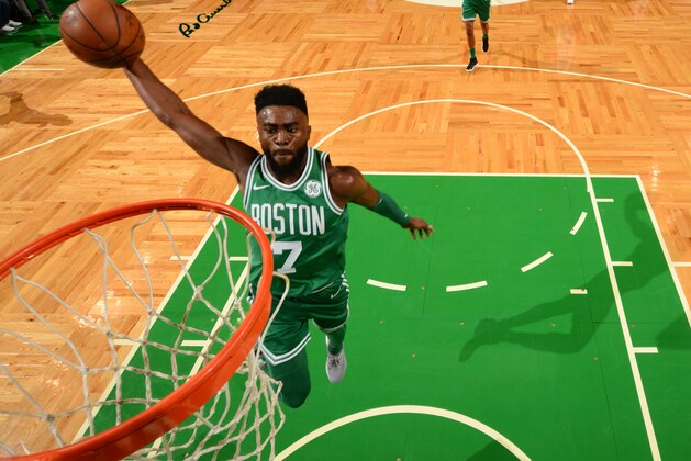 BOSTON, MA - NOVEMBER 16: Jaylen Brown #7 of the Boston Celtics dunks the ball during the game against the Golden State Warriors on November 16, 2017 at the TD Garden in Boston, Massachusetts. NOTE TO USER: User expressly acknowledges and agrees that, by downloading and or using this photograph, User is consenting to the terms and conditions of the Getty Images License Agreement. Mandatory Copyright Notice: Copyright 2017 NBAE (Photo by Jesse D. Garrabrant/NBAE via Getty Images)