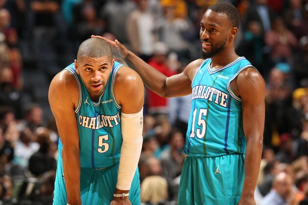 CHARLOTTE, NC - NOVEMBER 15:  Nicolas Batum #5 and Kemba Walker #15 of the Charlotte Hornets during the game against the Cleveland Cavaliers on November 15, 2017 at Spectrum Center in Charlotte, North Carolina. NOTE TO USER: User expressly acknowledges and agrees that, by downloading and or using this photograph, User is consenting to the terms and conditions of the Getty Images License Agreement.  Mandatory Copyright Notice:  Copyright 2017 NBAE (Photo by Kent Smith/NBAE via Getty Images)