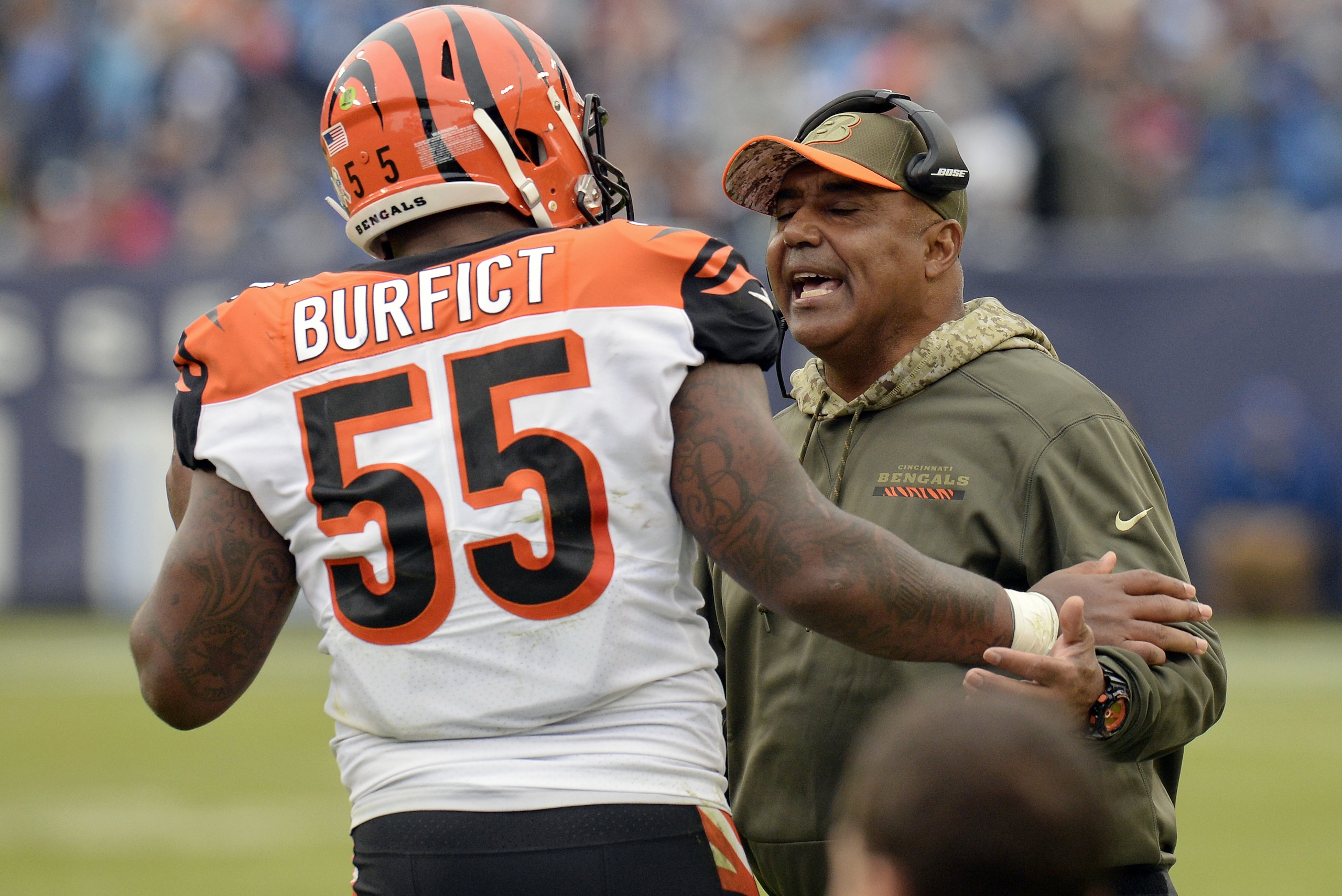 Cincinnati Bengals head coach Marvin Lewis talks with outside linebacker Vontaze Burfict (55) after Burfict was ejected for making contact with an official in the first half of an NFL football game against the Tennessee Titans Sunday, Nov. 12, 2017, in Nashville, Tenn. (AP Photo/Mark Zaleski)