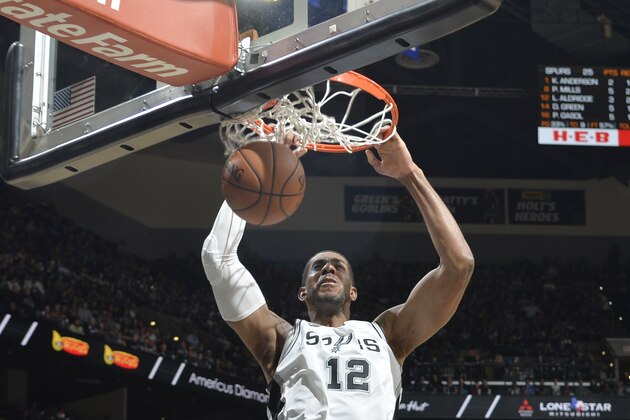 SAN ANTONIO, TX - NOVEMBER 17: LaMarcus Aldridge #12 of the San Antonio Spurs slams the dunk against the Oklahoma City Thunder on November 17, 2017 at the AT&T Center in San Antonio, Texas. NOTE TO USER: User expressly acknowledges and agrees that, by downloading and or using this photograph, user is consenting to the terms and conditions of the Getty Images License Agreement. Mandatory Copyright Notice: Copyright 2017 NBAE (Photos by Mark Sobhani/NBAE via Getty Images)