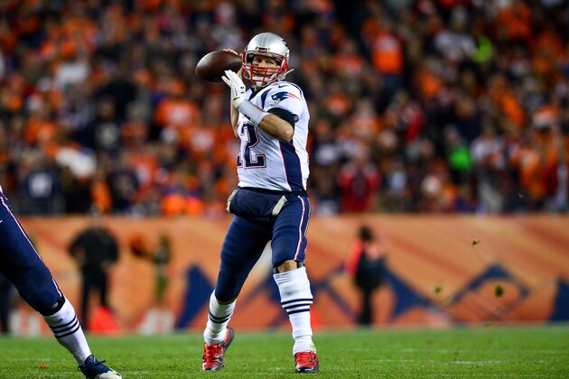 DENVER, CO - NOVEMBER 12:  Quarterback Tom Brady #12 of the New England Patriots passes against the Denver Broncos at Sports Authority Field at Mile High on November 12, 2017 in Denver, Colorado. (Photo by Dustin Bradford/Getty Images)