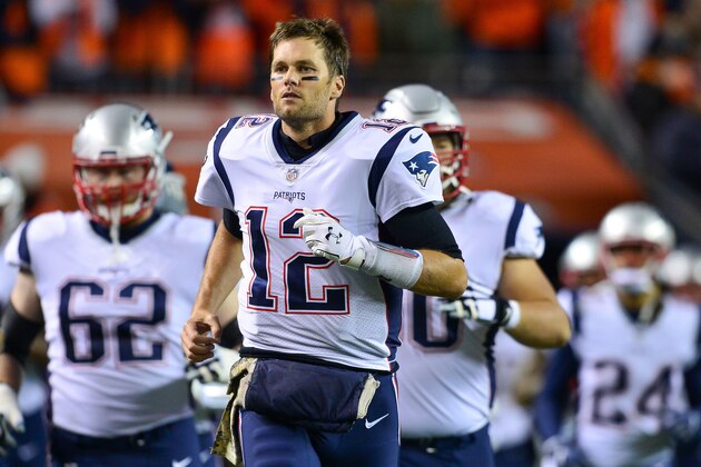 DENVER, CO - NOVEMBER 12: Quarterback Tom Brady #12 of the New England Patriots leads his team onto the field before a game against the Denver Broncos at Sports Authority Field at Mile High on November 12, 2017 in Denver, Colorado. (Photo by Dustin Bradford/Getty Images)