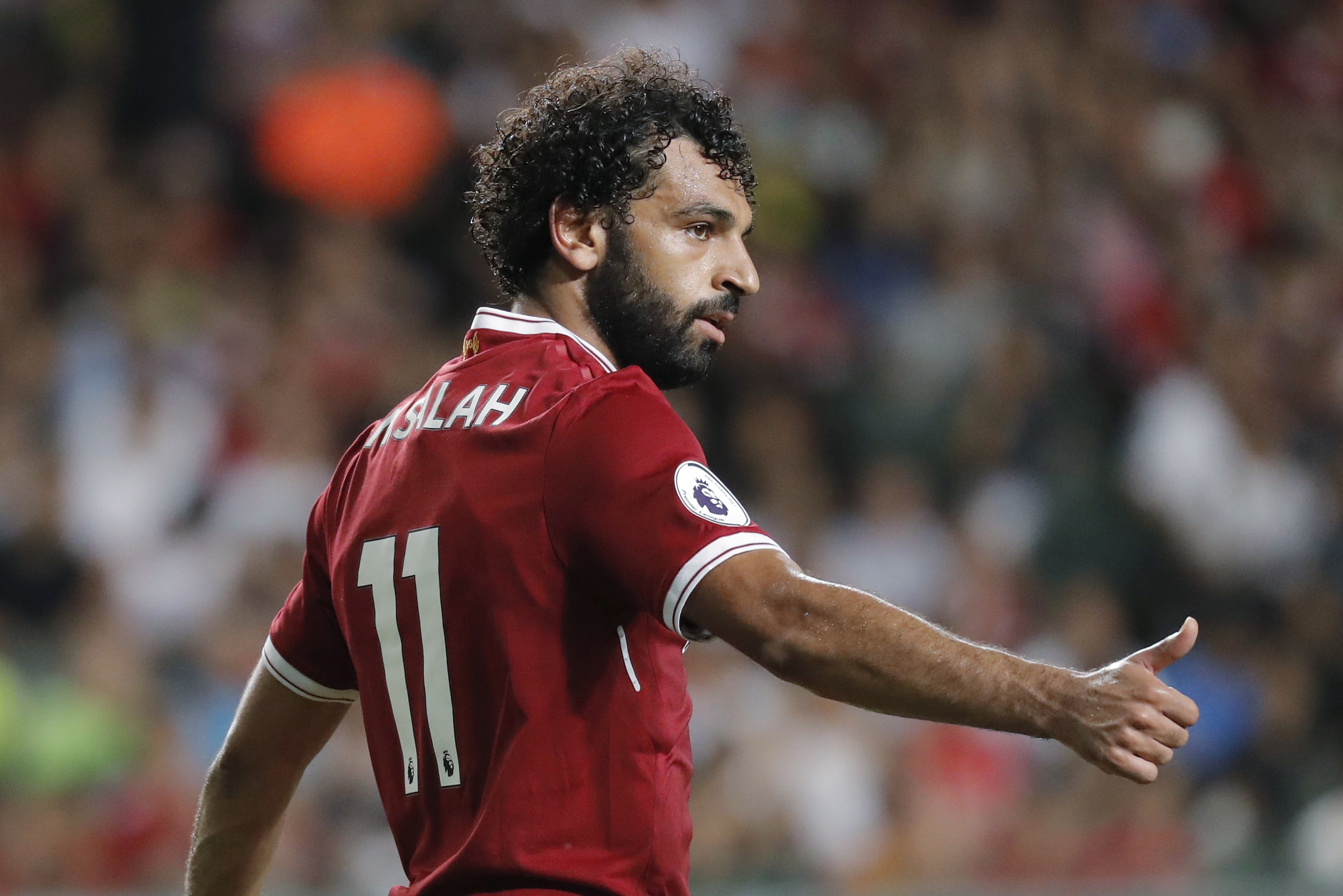 Liverpool's Mohamed Salah gestures during the final match against Leicester City FC at the Premier League Asia Trophy soccer tournament in Hong Kong, Saturday, July 22, 2017. (AP Photo/Kin Cheung)