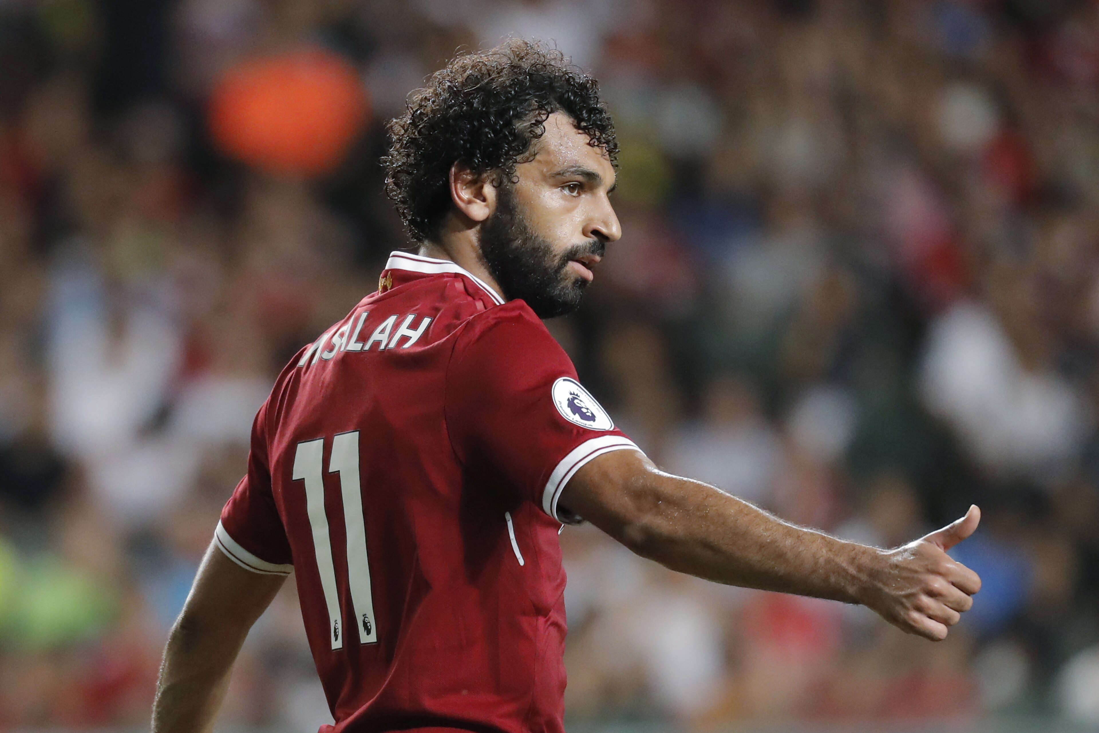 Liverpool's Mohamed Salah gestures during the final match against Leicester City FC at the Premier League Asia Trophy soccer tournament in Hong Kong, Saturday, July 22, 2017. (AP Photo/Kin Cheung)