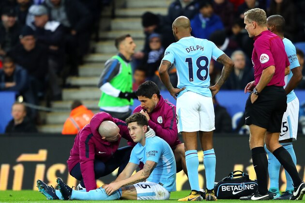 LEICESTER, ENGLAND - NOVEMBER 18:  John Stones of Manchester City receives medical treatment during the Premier League match between Leicester City and Manchester City at The King Power Stadium on November 18, 2017 in Leicester, England.  (Photo by Richard Heathcote/Getty Images)