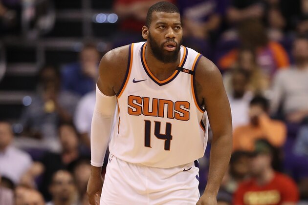 PHOENIX, AZ - NOVEMBER 16:  Greg Monroe #14 of the Phoenix Suns reacts during the first half of the NBA game against the Houston Rockets at Talking Stick Resort Arena on November 16, 2017 in Phoenix, Arizona. The Rockets defeated the Suns 142-116. NOTE TO USER: User expressly acknowledges and agrees that, by downloading and or using this photograph, User is consenting to the terms and conditions of the Getty Images License Agreement.  (Photo by Christian Petersen/Getty Images)