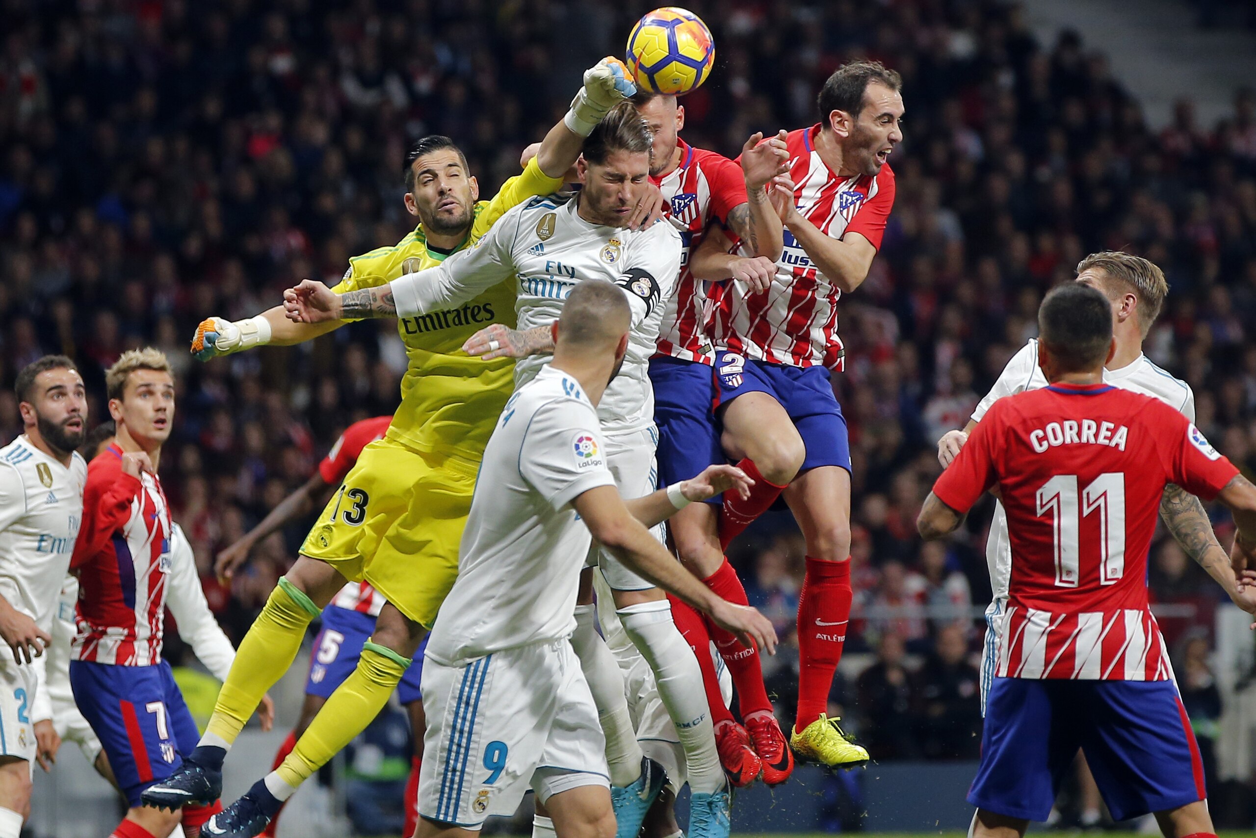 CAPTION CORRECTS THE ID: Real Madrid’s goalkeeper Kiko Casilla, center left, punches the ball clear during a Spanish La Liga soccer match between Atletico Madrid and Real Madrid at the Metropolitano stadium in Madrid, Spain, Saturday, Nov. 18, 2017. (AP Photo/Paul White) CAPTION CORRECTS THE ID: Real Madrid’s goalkeeper Kiko Casilla, center left, punches the ball clear during a Spanish La Liga soccer match between Atletico Madrid and Real Madrid at the Metropolitano stadium in Madrid, Spain, Saturday, Nov. 18, 2017. (AP Photo/Paul White)