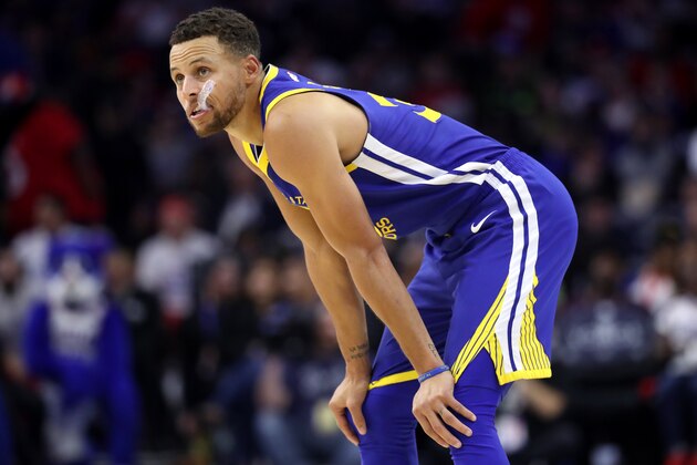 PHILADELPHIA, PA - NOVEMBER 18: Stephen Curry #30 of the Golden State Warriors looks on in the second half against the Philadelphia 76ers at Wells Fargo Center on November 18, 2017 in Philadelphia,Pennsylvania. NOTE TO USER: User expressly acknowledges and agrees that, by downloading and or using this photograph, User is consenting to the terms and conditions of the Getty Images License Agreement. (Photo by Rob Carr/Getty Images)