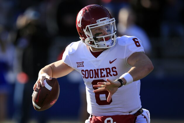 Oklahoma quarterback Baker Mayfield (6) during the first half of an NCAA college football game against Kansas in Lawrence, Kan., Saturday, Nov. 18, 2017. (AP Photo/Orlin Wagner)