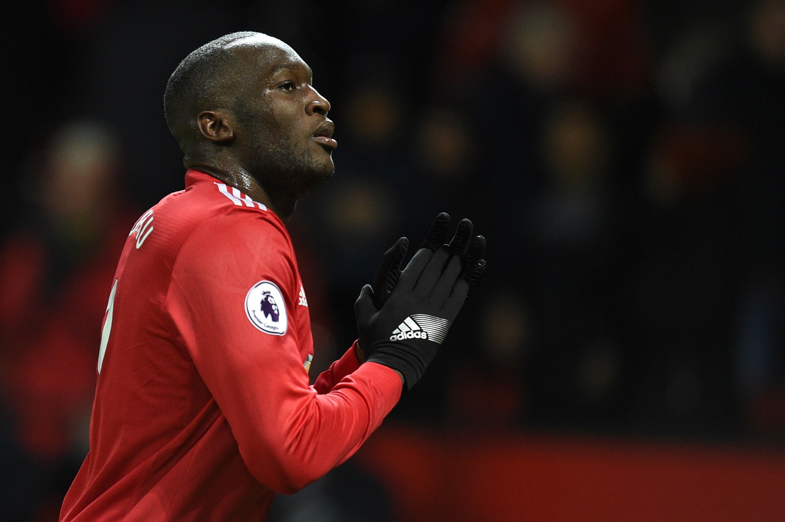 Manchester United's Belgian striker Romelu Lukaku applauds as he leaves the pitch at the end of the English Premier League football match between Manchester United and Newcastle at Old Trafford in Manchester, north west England, on November 18, 2017. / AFP PHOTO / Oli SCARFF / RESTRICTED TO EDITORIAL USE. No use with unauthorized audio, video, data, fixture lists, club/league logos or 'live' services. Online in-match use limited to 75 images, no video emulation. No use in betting, games or single club/league/player publications.  /         (Photo credit should read OLI SCARFF/AFP/Getty Images)