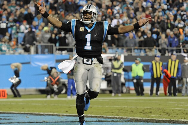 FILE - In this Nov. 13, 2017, file photo, Carolina Panthers' Cam Newton (1) fires up the fans after a Panthers touchdown against the Miami Dolphins in the second half of an NFL football game in Charlotte, N.C. The Panthers enter the bye weekend having won three straight, leaving them at 7-3 and a half-game behind the New Orleans Saints in the NFC South. (AP Photo/Mike McCarn, File)