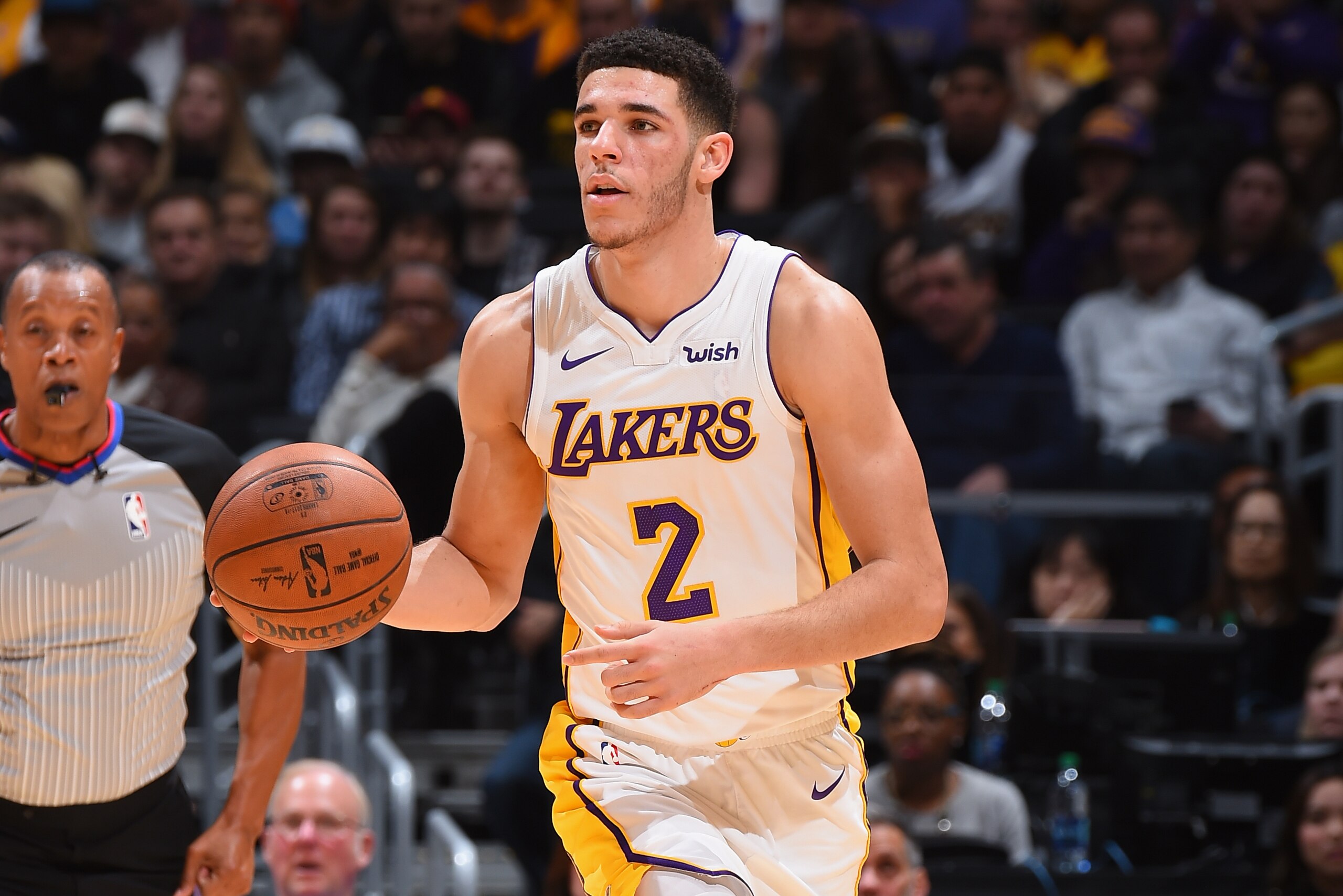 LOS ANGELES, CA - NOVEMBER 19:  Lonzo Ball #2 of the Los Angeles Lakers handles the ball against the Denver Nuggets on November 19, 2017 at STAPLES Center in Los Angeles, California. NOTE TO USER: User expressly acknowledges and agrees that, by downloading and/or using this Photograph, user is consenting to the terms and conditions of the Getty Images License Agreement. Mandatory Copyright Notice: Copyright 2017 NBAE (Photo by Andrew D. Bernstein/NBAE via Getty Images)