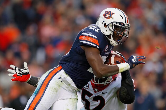 AUBURN, AL - NOVEMBER 11: Kerryon Johnson #21 of the Auburn Tigers rushes against Tyler Clark #52 of the Georgia Bulldogs at Jordan Hare Stadium on November 11, 2017 in Auburn, Alabama. (Photo by Kevin C. Cox/Getty Images) AUBURN, AL - NOVEMBER 11: Kerryon Johnson #21 of the Auburn Tigers rushes against Tyler Clark #52 of the Georgia Bulldogs at Jordan Hare Stadium on November 11, 2017 in Auburn, Alabama. (Photo by Kevin C. Cox/Getty Images)