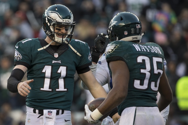 PHILADELPHIA, PA - JANUARY 1: Carson Wentz #11 of the Philadelphia Eagles celebrates with Terrell Watson #35 against the Dallas Cowboys at Lincoln Financial Field on January 1, 2017 in Philadelphia, Pennsylvania. The Eagles defeated the Cowboys 27-13. (Photo by Mitchell Leff/Getty Images)