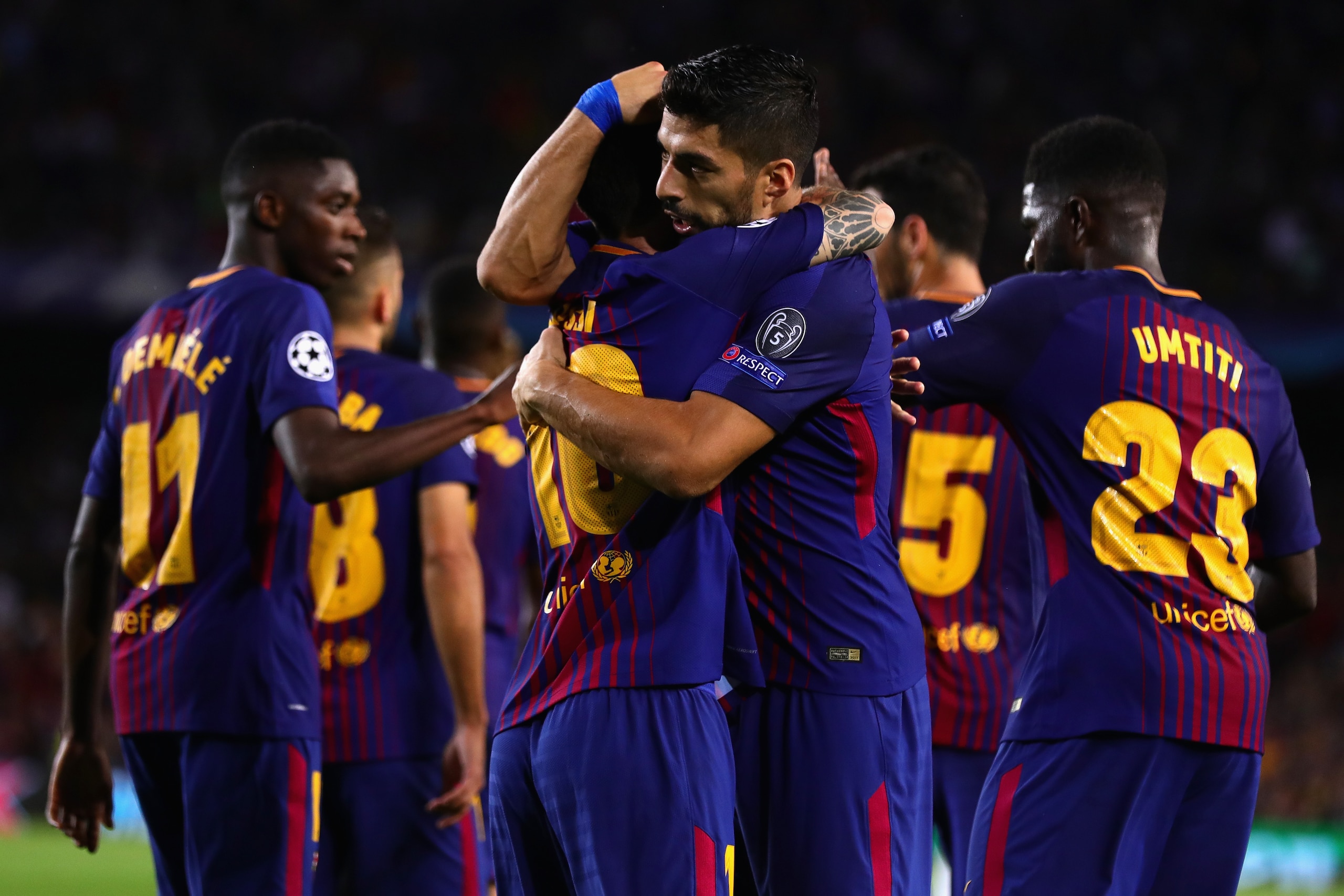 BARCELONA, SPAIN - SEPTEMBER 12: Lionel Messi of FC Barcelona is congratulated by Luis Suarez of FC Barcelona after scoring his sides third goal during the UEFA Champions League group D match between FC Barcelona and Juventus at Camp Nou on September 12, 2017 in Barcelona, Spain.  (Photo by Chris Brunskill Ltd/Getty Images)