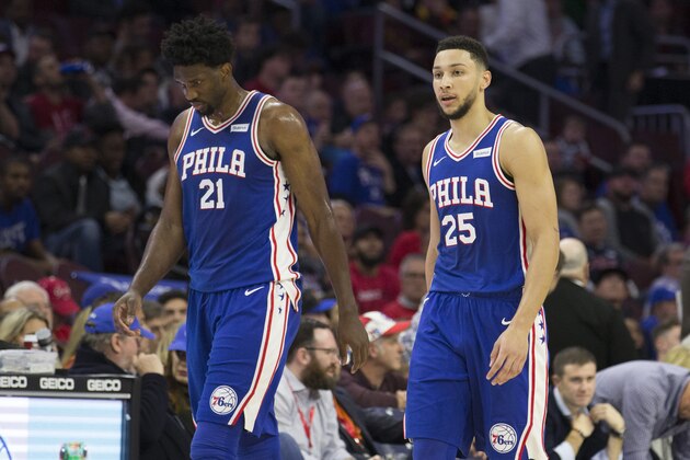 PHILADELPHIA, PA - NOVEMBER 1: Joel Embiid #21 and Ben Simmons #25 of the Philadelphia 76ers walk to the bench against the Atlanta Hawks at the Wells Fargo Center on November 1, 2017 in Philadelphia, Pennsylvania. NOTE TO USER: User expressly acknowledges and agrees that, by downloading and or using this photograph, User is consenting to the terms and conditions of the Getty Images License Agreement. (Photo by Mitchell Leff/Getty Images)