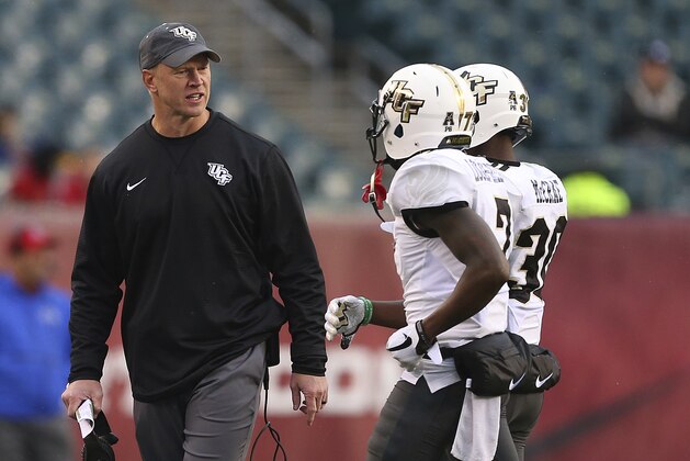 Central Florida head coach Scott Frost during the third quarter against Temple in an NCAA college football game Saturday, Nov. 18, 2017, in Philadelphia. UCF defeated Temple 45-19. (AP Photo/Rich Schultz)