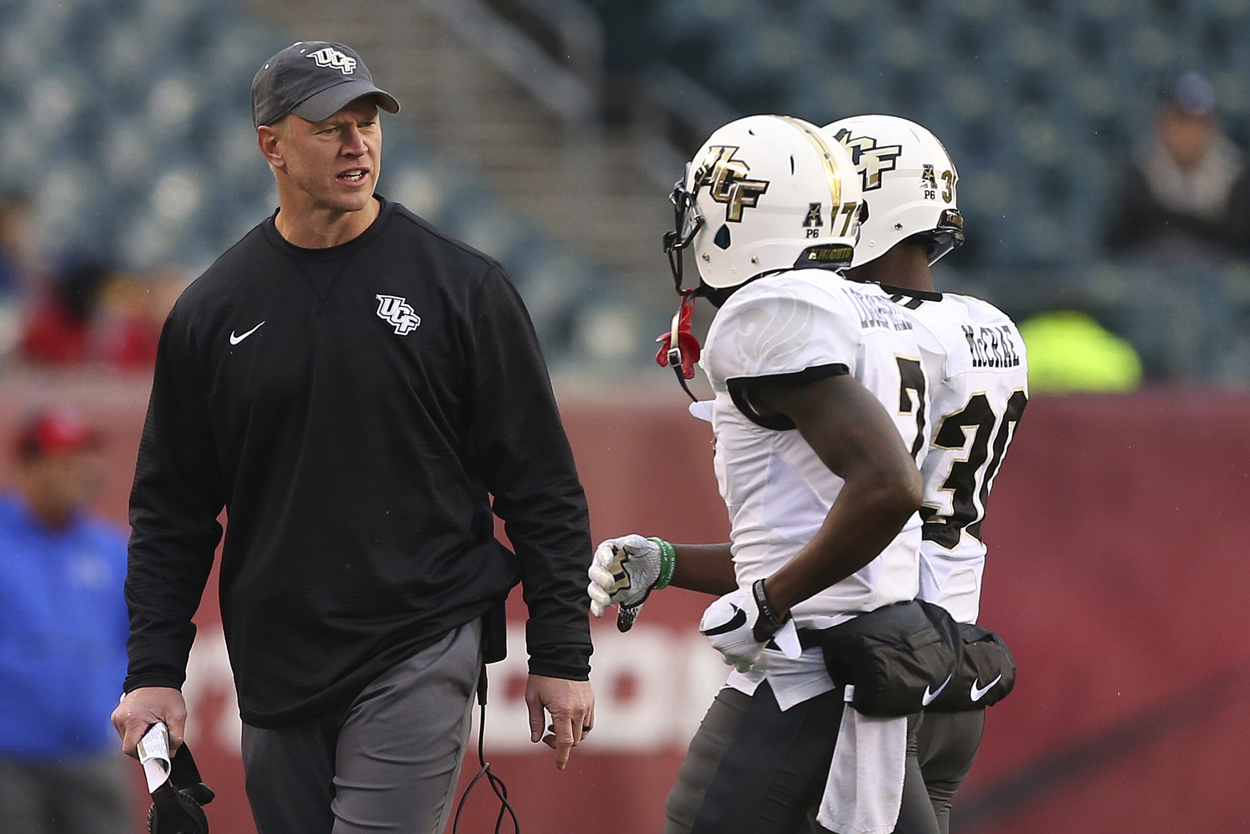 Central Florida head coach Scott Frost during the third quarter against Temple in an NCAA college football game Saturday, Nov. 18, 2017, in Philadelphia. UCF defeated Temple 45-19. (AP Photo/Rich Schultz) Central Florida head coach Scott Frost during the third quarter against Temple in an NCAA college football game Saturday, Nov. 18, 2017, in Philadelphia. UCF defeated Temple 45-19. (AP Photo/Rich Schultz)