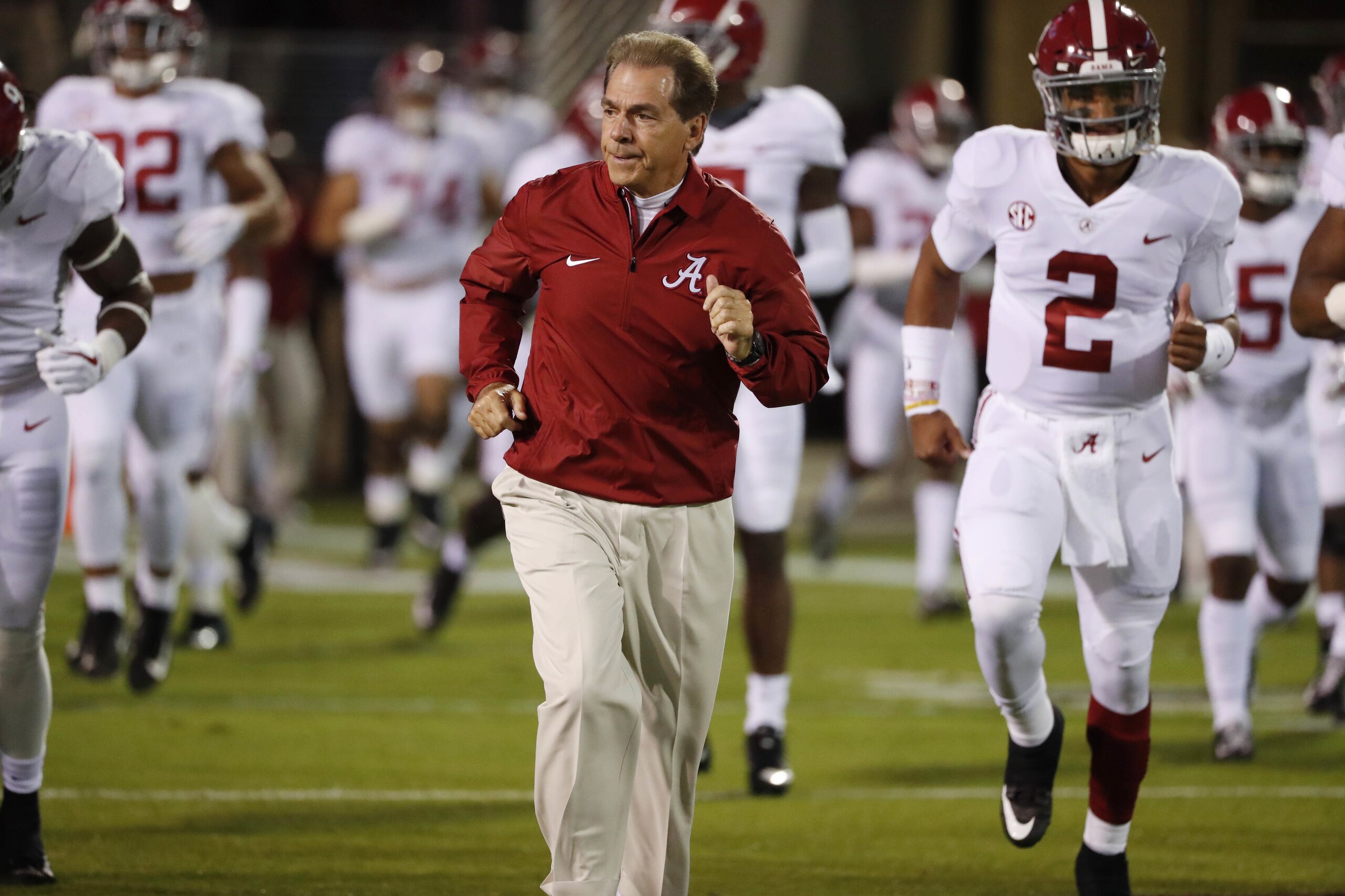 Alabama head coach Nick Saban leads his team to the field for pre-game warmups prior to an NCAA college football game against Mississippi State in Starkville, Miss., Saturday, Nov. 11, 2017. Alabama won 31-24. (AP Photo/Rogelio V. Solis)