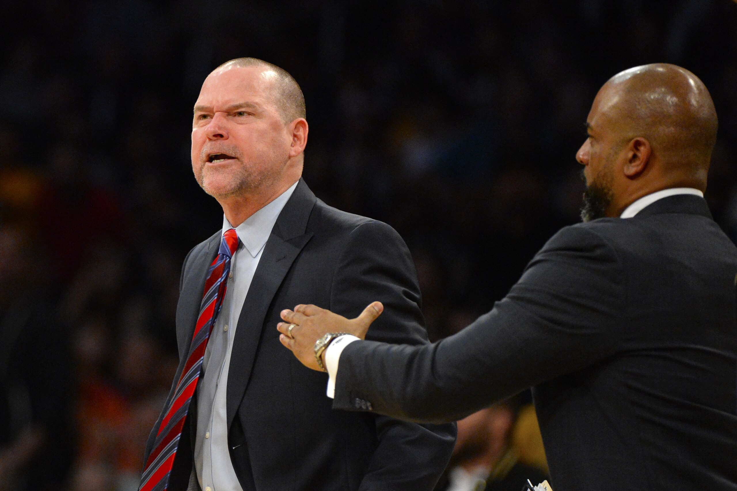 LOS ANGELES, CA - NOVEMBER 19:  Michael Malone, head coach of the Denver Nuggets is held back by assistant coach Wes Unseld Jr. as he gets ejected from the game against the Los Angeles Lakers on November 19, 2017 at STAPLES Center in Los Angeles, California. NOTE TO USER: User expressly acknowledges and agrees that, by downloading and or using this photograph, User is consenting to the terms and conditions of the Getty Images License Agreement.Ê (Photo by Robert Laberge/Getty Images)