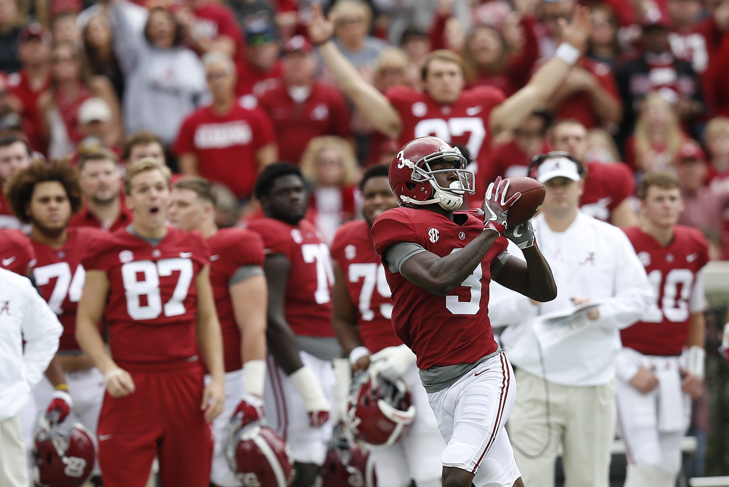Alabama wide receiver Calvin Ridley catches the pass and runs in to score a touchdown against Mercer during the first half of an NCAA college football game, Saturday, Nov. 18, 2017, in Tuscaloosa, Ala. (AP Photo/Brynn Anderson)