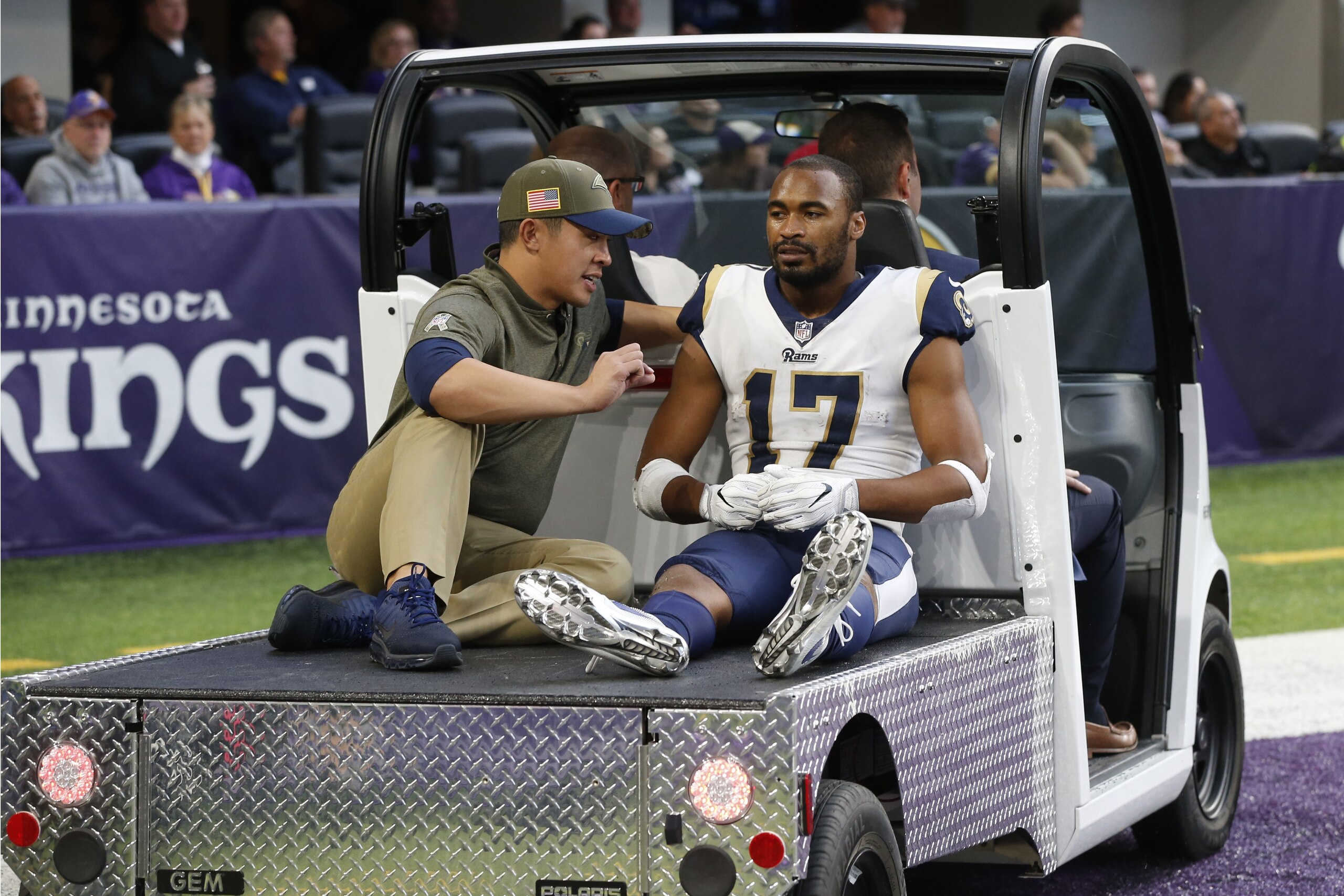Los Angeles Rams wide receiver Robert Woods (17) is carted off the field after getting injured during the second half of an NFL football game against the Minnesota Vikings, Sunday, Nov. 19, 2017, in Minneapolis. The Vikings won 24-7. (AP Photo/Jim Mone)