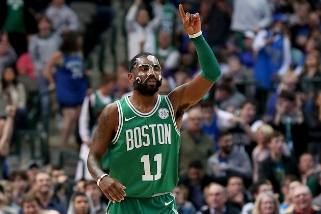 DALLAS, TX - NOVEMBER 20:  Kyrie Irving #11 of the Boston Celtics celebrates against the Dallas Mavericks at American Airlines Center on November 20, 2017 in Dallas, Texas. NOTE TO USER: User expressly acknowledges and agrees that, by downloading and or using this photograph, User is consenting to the terms and conditions of the Getty Images License Agreement.  (Photo by Tom Pennington/Getty Images)