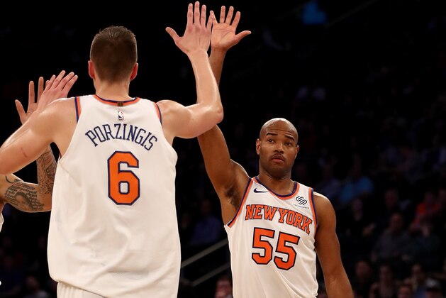 NEW YORK, NY - NOVEMBER 03:  Kristaps Porzingis #6 and Jarrett Jack #55 of the New York Knicks celebrate in the second half against the Phoenix Suns at Madison Square Garden on November 3, 2017 in New York City. NOTE TO USER: User expressly acknowledges and agrees that, by downloading and or using this Photograph, user is consenting to the terms and conditions of the Getty Images License Agreement  (Photo by Elsa/Getty Images)