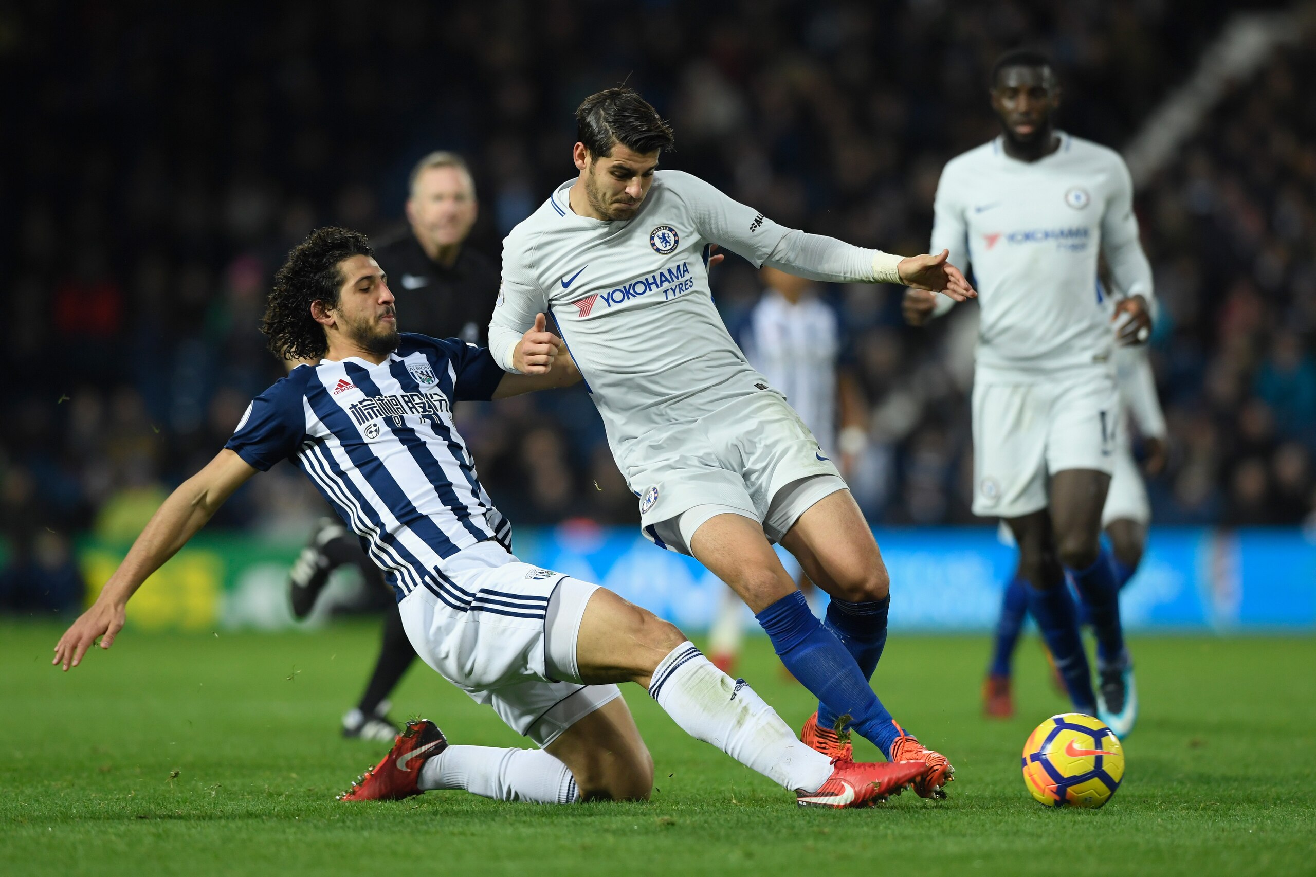 WEST BROMWICH, ENGLAND - NOVEMBER 18: Alvaro Morata of Chelsea is tackled by Ahmed El-Sayed Hegazi of West Bromwich Albion during the Premier League match between West Bromwich Albion and Chelsea at The Hawthorns on November 18, 2017 in West Bromwich, England. (Photo by Stu Forster/Getty Images)