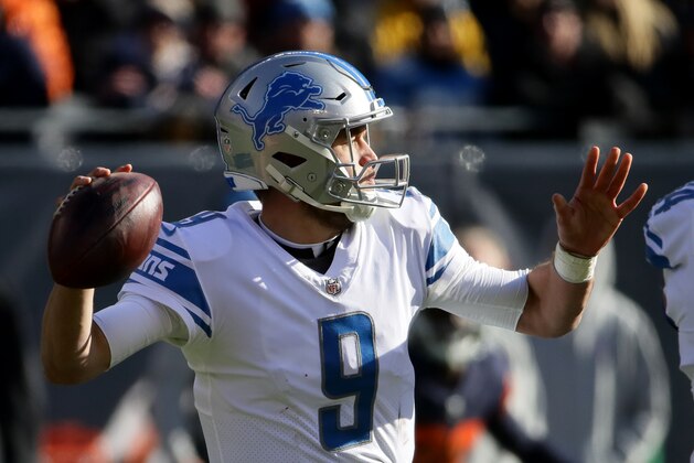 CHICAGO, IL - NOVEMBER 19:  Quarterback Matthew Stafford #9 of the Detroit Lions looks to pass the football in the first quarter against the Chicago Bears at Soldier Field on November 19, 2017 in Chicago, Illinois.  (Photo by Jonathan Daniel/Getty Images)