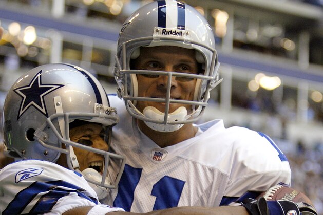 Dallas Cowboys wide receiver Terry Glenn, left, is congratulated by Cowboys quarterback Drew Bledsoe (11) after a 38-yard touchdown pass against the Philadelphia Eagles in the first quarter in Irving, Texas, Sunday Oct. 9, 2005. (AP Photo/Tim Sharp)
