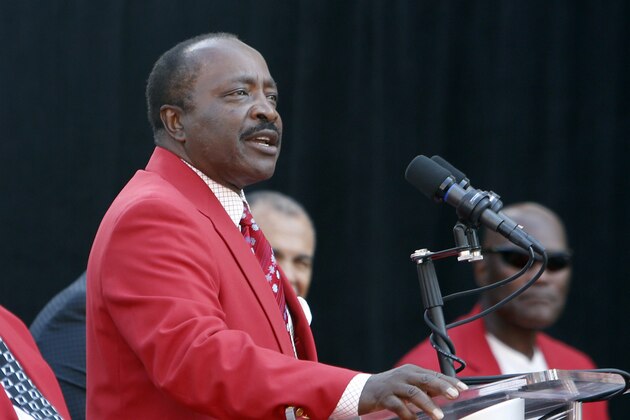 Hall of Fame second baseman Joe Morgan speaks during his statue dedication at Great American Ball Park, Saturday, Sept. 7, 2013, in Cincinnati. (AP Photo/David Kohl)