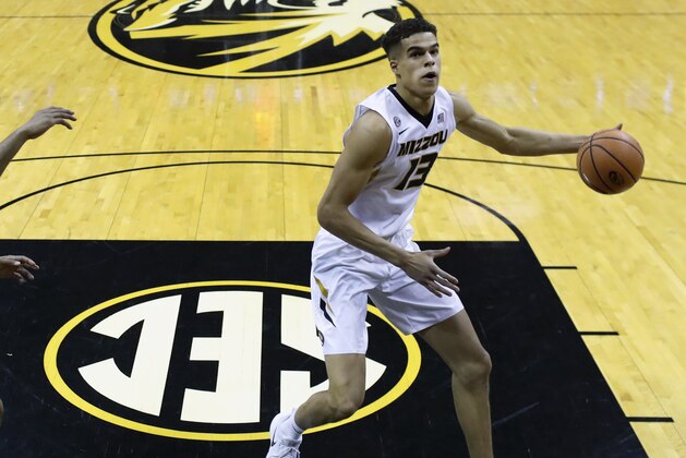 Missouri's Michael Porter Jr., right, heads to the basket as Iowa State's Jeff Beverly defends during the first half of an NCAA college basketball game Friday, Nov. 10, 2017, in Columbia, Mo. (AP Photo/Jeff Roberson)