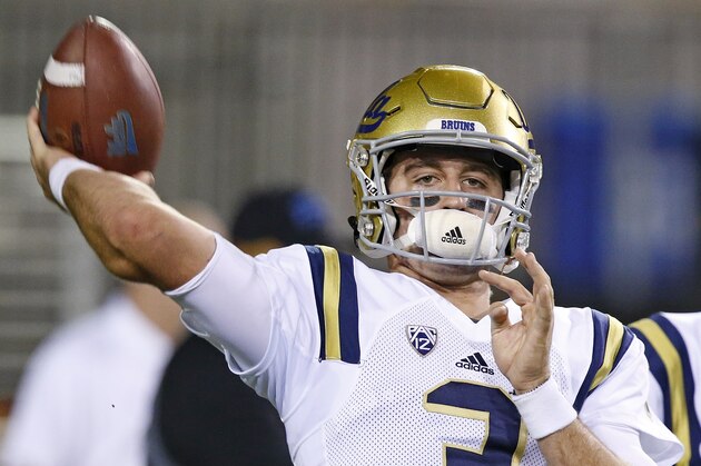 FILE - This Oct. 8, 2016 file photo shows UCLA quarterback Josh Rosen warming up prior to an NCAA college football game against Arizona State in Tempe, Ariz. Rosen will try to lead a turnaround for the Bruins. Rosen has the type of talent that championship teams are built around, but the Bruins haven't provided him much stability. A breakthrough season by Rosen could make UCLA one of the top turnaround teams in the country, give job security to coach Jim Mora and turn Rosen into a top-five pick in next year's NFL draft.  (AP Photo/Ross D. Franklin)