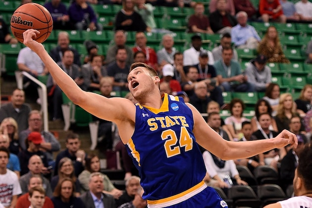 SALT LAKE CITY, UT - MARCH 16: Mike Daum #24 of the South Dakota State Jackrabbits reaches for a loose ball in the first half against the Gonzaga Bulldogs during the first round of the 2017 NCAA Men's Basketball Tournament at Vivint Smart Home Arena on March 16, 2017 in Salt Lake City, Utah.  (Photo by Gene Sweeney Jr./Getty Images)