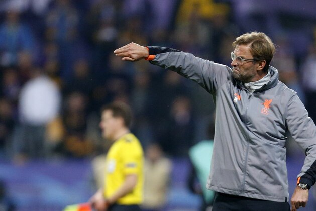 Liverpool coach Jurgen Klopp gives directions to his players during the Champions League soccer match between Maribor and Liverpool at the Ljudski vrt stadium, in Maribor, Slovenia, Tuesday, Oct. 17, 2017. (AP Photo/Darko Bandic)