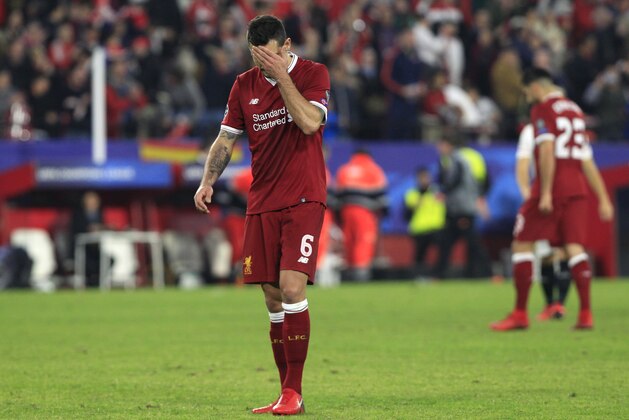 Liverpool's Dejan Lovren reacts at the end of a Champions League group E soccer match between Sevilla and Liverpool, at the Ramon Sanchez Pizjuan stadium in Seville, Spain, Tuesday, Nov. 21, 2017. Sevilla tied the game 3-3 in the last minute. (AP Photo/Miguel Morenatti)