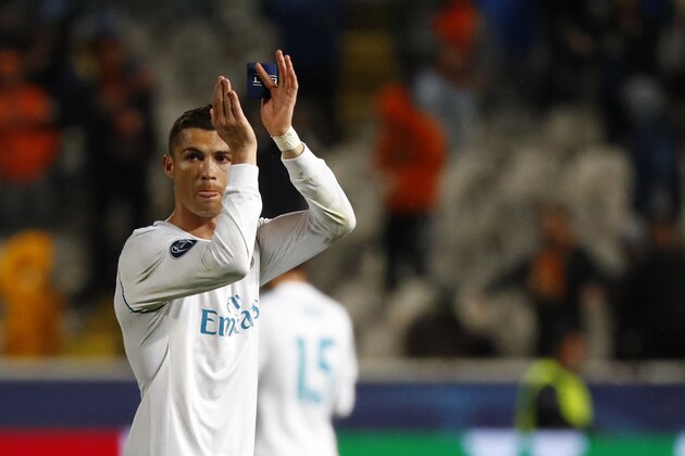 Real Madrid's Portuguese forward Cristiano Ronaldo gestures at the end of the UEFA Champions League Group H match between Apoel FC and Real Madrid on November 21, 2017, in the Cypriot capital Nicosia's GSP Stadium.
Real Madrid defeated Apeol 6-0. / AFP PHOTO / Jack GUEZ (Photo credit should read JACK GUEZ/AFP/Getty Images) Real Madrid's Portuguese forward Cristiano Ronaldo gestures at the end of the UEFA Champions League Group H match between Apoel FC and Real Madrid on November 21, 2017, in the Cypriot capital Nicosia's GSP Stadium.
Real Madrid defeated Apeol 6-0. / AFP PHOTO / Jack GUEZ (Photo credit should read JACK GUEZ/AFP/Getty Images)