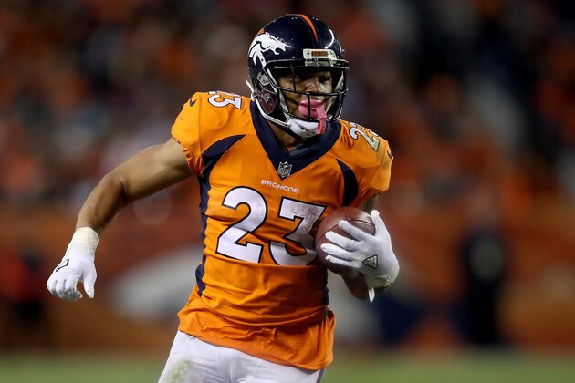 DENVER, CO - NOVEMBER 19:  Devontae Booker #23 of the Denver Broncos carries the ball against the Cincinnati Bengals at Sports Authority Field at Mile High on November 19, 2017 in Denver, Colorado.  (Photo by Matthew Stockman/Getty Images)