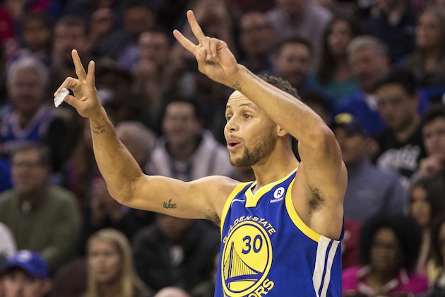 Golden State Warriors' Stephen Curry reacts during the first half of an NBA basketball game against the Philadelphia 76ers, Saturday, Nov. 18, 2017, in Philadelphia. The Warriors won 124-116. (AP Photo/Chris Szagola)