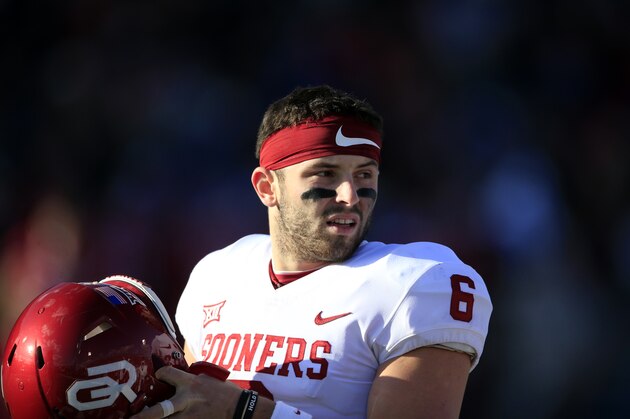 Oklahoma quarterback Baker Mayfield (6) during the first half of an NCAA college football game against Kansas in Lawrence, Kan., Saturday, Nov. 18, 2017. (AP Photo/Orlin Wagner)