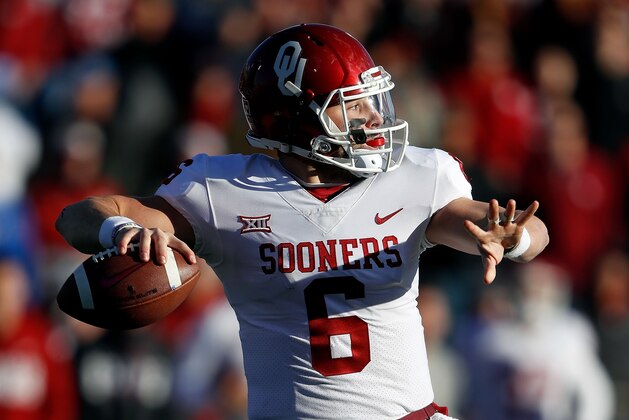 LAWRENCE, KS - NOVEMBER 18: Quarterback Baker Mayfield #6 of the Oklahoma Sooners passes during the game against the Kansas Jayhawks at Memorial Stadium on November 18, 2017 in Lawrence, Kansas. (Photo by Jamie Squire/Getty Images) LAWRENCE, KS - NOVEMBER 18: Quarterback Baker Mayfield #6 of the Oklahoma Sooners passes during the game against the Kansas Jayhawks at Memorial Stadium on November 18, 2017 in Lawrence, Kansas. (Photo by Jamie Squire/Getty Images)