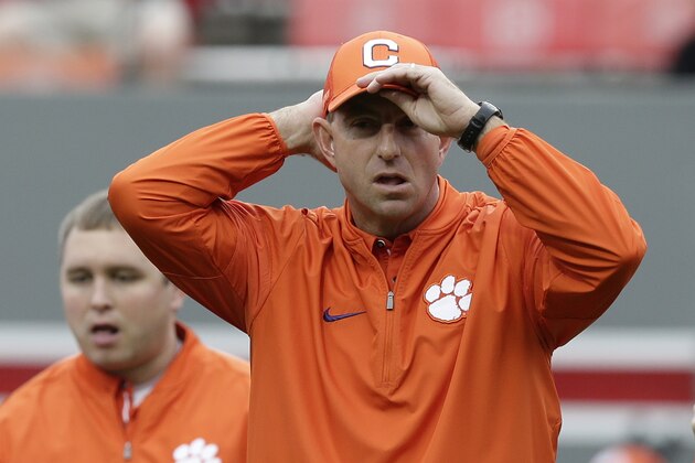 Clemson head coach Dabo Swinney watches prior to an NCAA college football game against North Carolina State in Raleigh, N.C., Saturday, Nov. 4, 2017. (AP Photo/Gerry Broome)