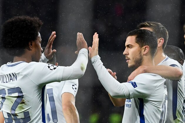 Chelsea's midfielder from Belgium Eden Hazard (R) celebrates after scoring a goal from the penalty spot during the UEFA Champions League Group C football match between Qarabag FK and Chelsea FC in Baku on November 22, 2017. / AFP PHOTO / Kirill KUDRYAVTSEV        (Photo credit should read KIRILL KUDRYAVTSEV/AFP/Getty Images)