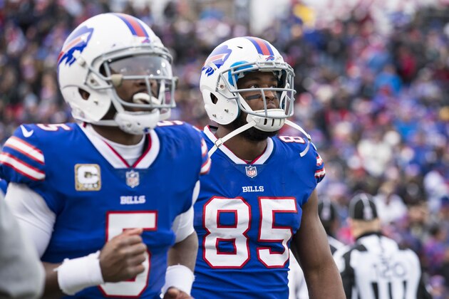ORCHARD PARK, NY - NOVEMBER 12:  Tyrod Taylor #5 and Charles Clay #85 of the Buffalo Bills look towards the scoreboard after a New Orleans Saints caught an interception between the pair during the third quarter at New Era Field on November 12, 2017 in Orchard Park, New York. New Orleans defeats Buffalo 47-10.  (Photo by Brett Carlsen/Getty Images)